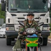 Paul Barber, as Horse, in front of a lorry on a mobility scooter in the new Full Monty series. Picture: Disney+