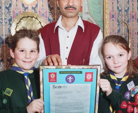 Liaquat Ali pictured with 42nd Doncaster Scouts Emma Riley and Matthew Burham in 1996