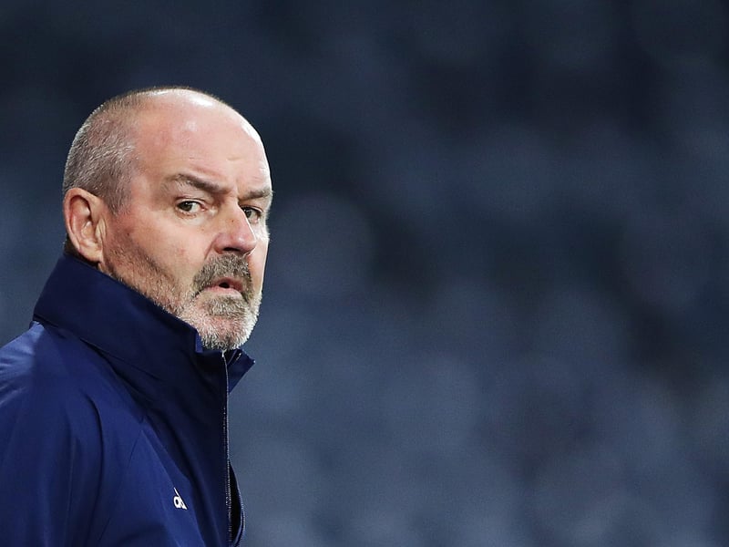 Scotland manager was linked with the role while at Kilmarnock but stormed to the top of bookmakers' markets a fortnight ago. Has spoken of loyalty to Scotland job and his contentment with role.