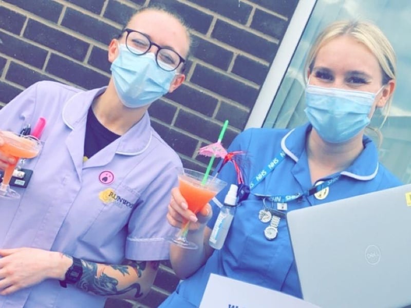 Care home staff enjoying a cocktail.