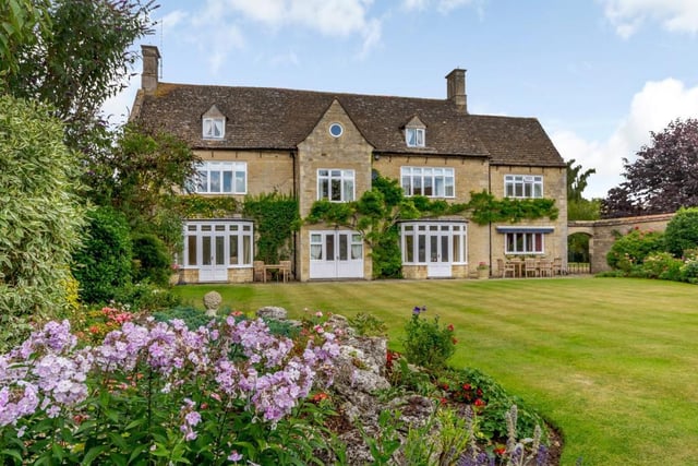 Situated in the pretty village of Bainton, this delightful farmhouse has a wealth of amenities close by and offers luxurious accommodation, with eight bedrooms, several outbuildings and its own outdoor swimming pool. Price: £1,750,000.