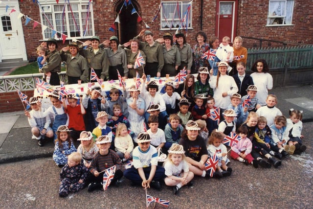 These happy people were celebrating the anniversary of VE Day. Can you tell us more about the people in the photo?