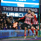 Birmingham, England, 4th February 2022. Jayden Bogle of Sheffield Utd celebrates scoring his sides second goal with Billy Sharp of Sheffield Utd during the Sky Bet Championship match at St Andrews, Birmingham. Picture credit should read: Simon Bellis / Sportimage