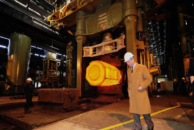 The Prince of Wales visiting Sheffield Forgemasters International in November 2008, one of several visits he made to see progress after the June 2007 floods