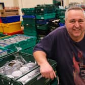 Chris Hardy in the warehouse at S6 foodbank in Hillsborough