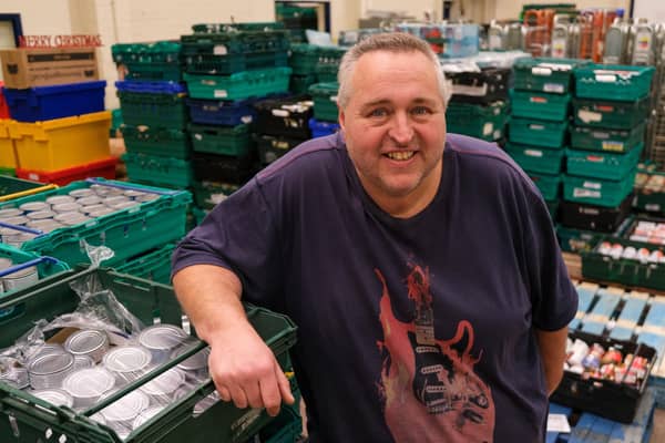 Chris Hardy in the warehouse at S6 foodbank in Hillsborough