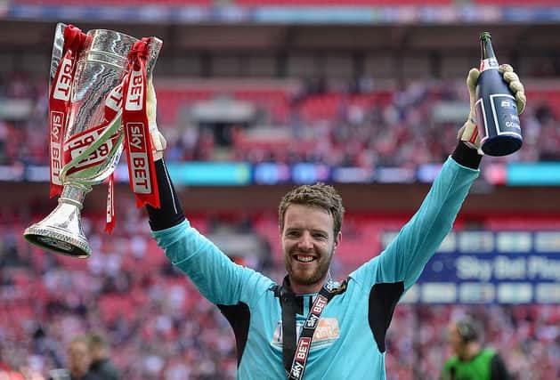 Job done: Adam Collin, of Rotherham United, celebrates Wembley victory. Photo by Jamie McDonald/Getty Images