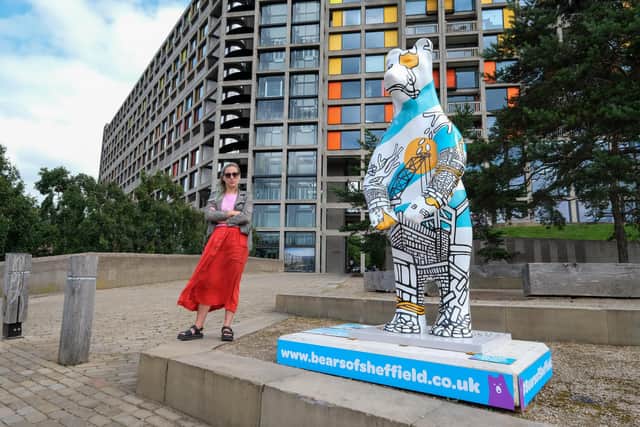 Artist Jo Peel with her Bear Doug who is outside Park Hill Flats