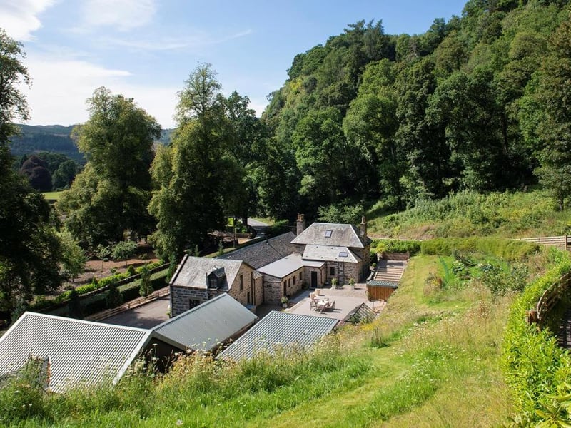 View over property from raised terrace.