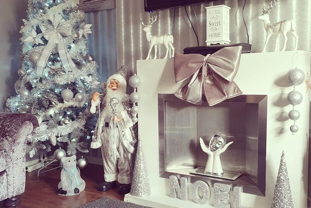 All set for Christmas with a white and silver theme.