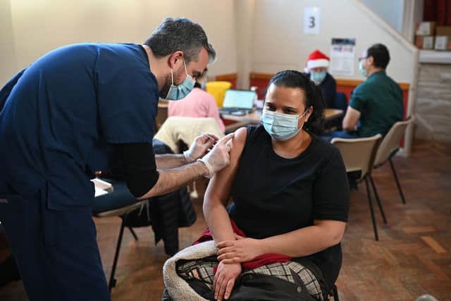 More than 55,000 people in Sheffield received a Covid booster or third vaccine dose in the week ending Monday, December 20, latest figures show (Photo by OLI SCARFF/AFP via Getty Images)