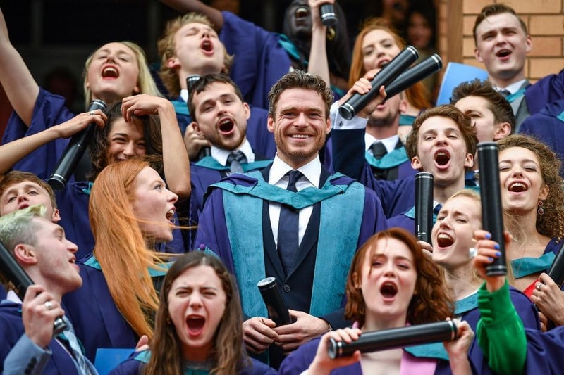 Richard Madden stands on the steps of the Royal Conservatoire of Scotland following receiving an honorary doctorate for his contribution to drama in 2019.