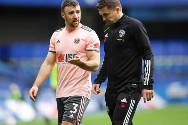 Enda Stevens of Sheffield Utd  talks to Paul Heckingbottom interim manager of Sheffield Utd at half time during the FA Cup match at Stamford Bridge, London. Picture date: 21st March 2021. Picture credit should read: David Klein/Sportimage