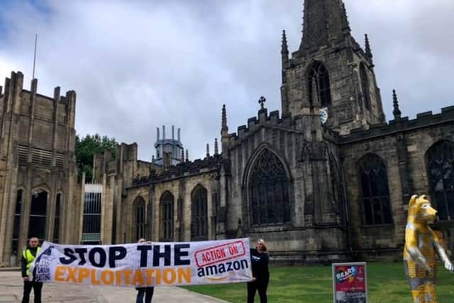 'Stop the Exploitation' banner was seen in front of Sheffield's Cathedral.