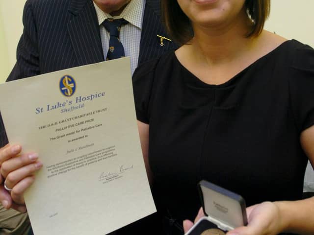 Staff Nurse Julie Readman pictured at St Luke's Hospice after being presented with the Grant Charitable Trust Award by Professor Eric Wilkes in October 2007