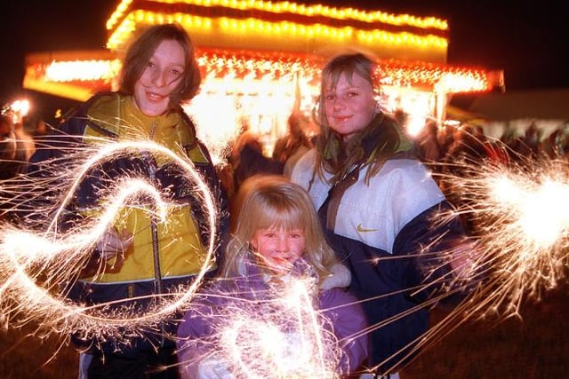 Armthorpe fire work display in 1998, three children with sparklers.