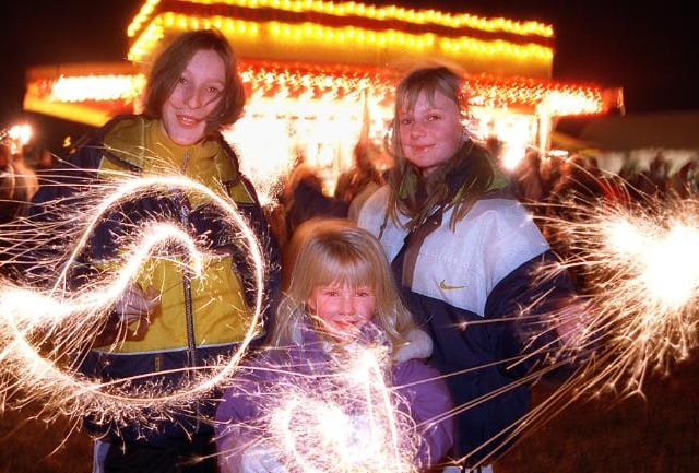 Armthorpe fire work display in 1998, three children with sparklers.