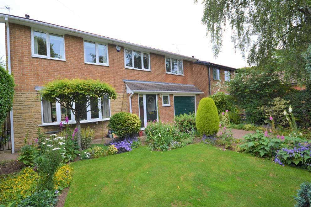 Park Drive Sprotbrough - With mature hedge boundaries to the front garden which offer a good level of privacy, mainly laid to lawn with well stocked borders, providing a superb variety of colours and textures, to the side is a driveway which gives access to the garage.