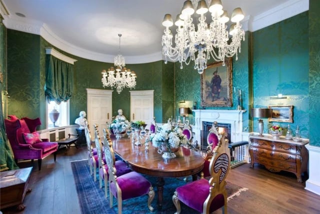 The glamorous, silk-lined dining room is the height of sophistication and the perfect place for dinner parties.