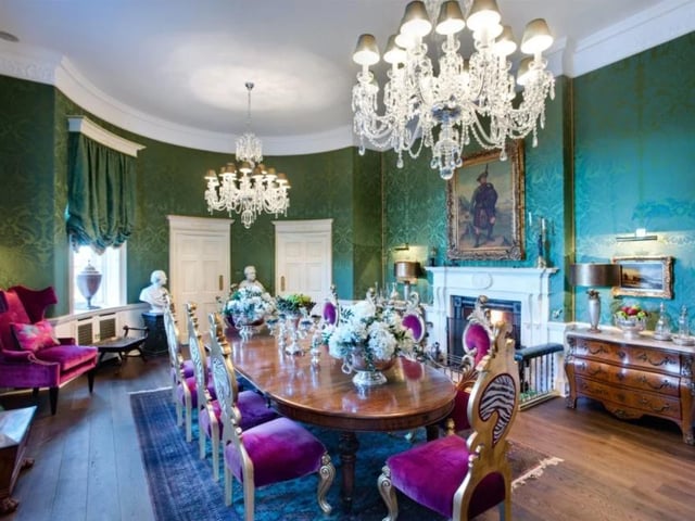 The glamorous, silk-lined dining room is the height of sophistication and the perfect place for dinner parties.
