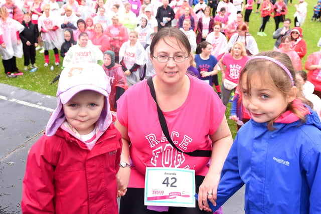 Amelia Gray (3),  who won her battle with cancer,  led a pink army against the disease at Cancer Research UK’s Race for Life in Kirkcaldy - with mum Amanda and sister Rhian, (4)