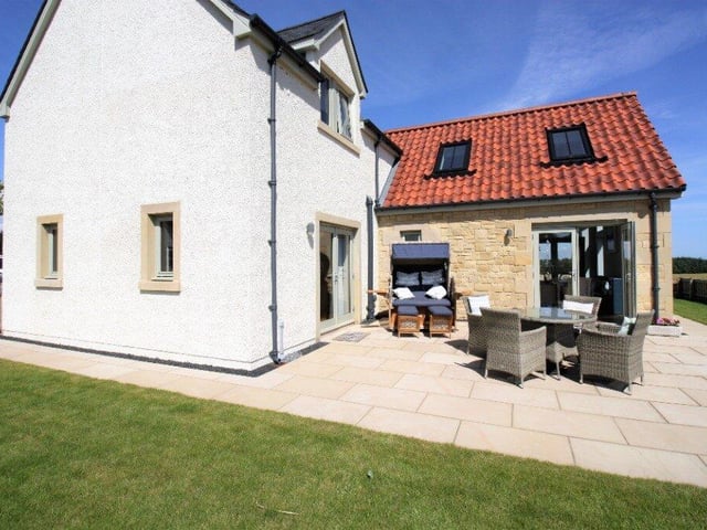 Located 10 minutes drive from St Andrews, this truly stunning four-bedroom family home is in a fantastic location and has ample outdoor space and seating - £18,000 total stay.