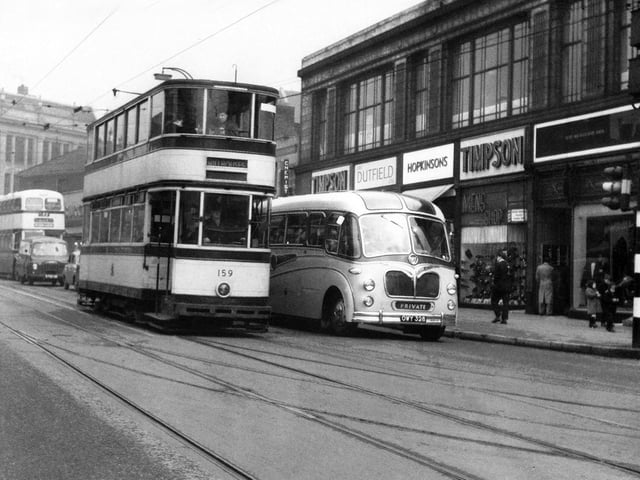 Trams run along Attercliffe Road, Sheffield, in the 1950s