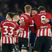 Sheffield United manager Paul Heckingbottom with Oliver McBurnie and Sander Berge following the win over Blackburn Rovers at Bramall Lane. Mike Egerton/PA Wire.