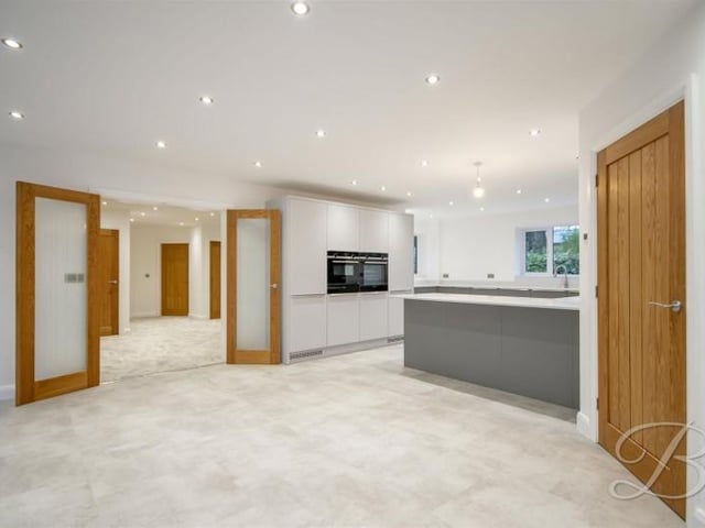 There is also access to a utility room.