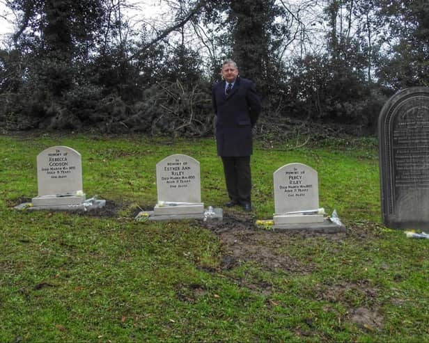 North East Derbyshire District Council leader Martin Thacker with the three new gravestones in of children who died in an accident at Plumbley colliery in 1895.