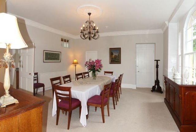 The large dining room is flooded with light and can sit quite a few people comfortably