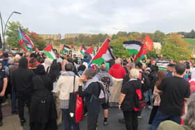Protesters at a demonstration called by Sheffield Palestine Solidarity Campaign in support of the people of Gaza. People later marched up to Sheffield Town Hall, where protesters climbed up to take down an Israeli flag and replace it with a Palestine one. Picture: Claire Chandler