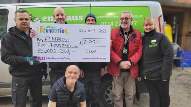 Picture shows, left to right, Emmaus Companions Peter Bankos, Steve Croaker, Ian Footitt, chief executive officer Graham Bostock and Asda Community Champion Alison Canning with (front row) companion Dave Footitt