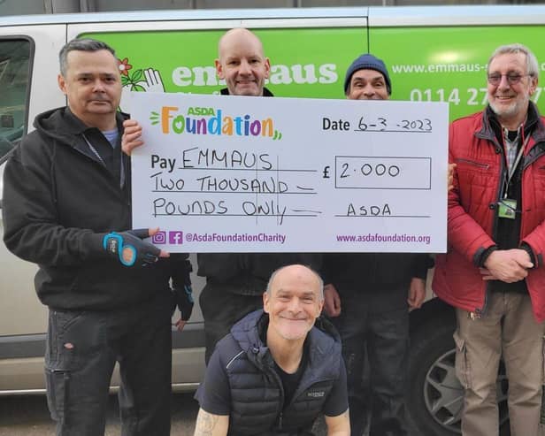 Picture shows, left to right, Emmaus Companions Peter Bankos, Steve Croaker, Ian Footitt, chief executive officer Graham Bostock and Asda Community Champion Alison Canning with (front row) companion Dave Footitt