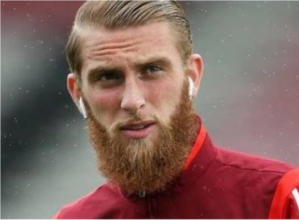 Footage has emerged of Oli McBurnie appearing to kick a fan during the Nottingham Forest pitch invasion.