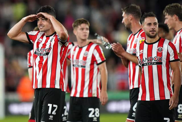 Sheffield United's John Egan (left) has been a key man for the Blades and reportedly attracted interest from Leeds United: Tim Goode/PA Wire.