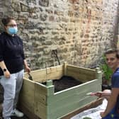 Prince's Trust volunteers, Sammie Auty and Harry Waddington, sprucing up a homeless centre
