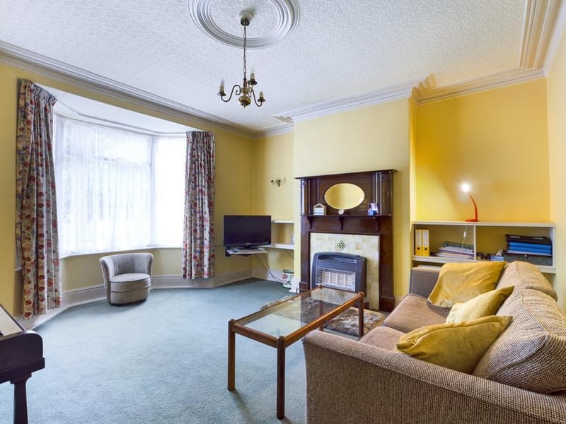 Lounge - Timber framed single glazed bay window to the front elevation, ceiling coving, wall light points, period fire surround with tiled inset and outset gas fire; power points.