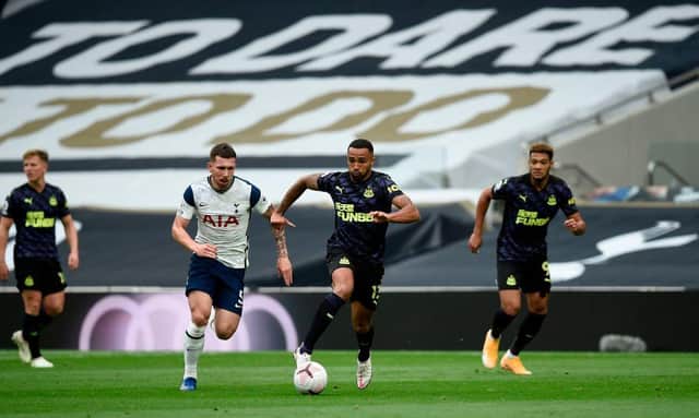 Tottenham Hotspur's Danish midfielder Pierre-Emile Hojbjerg (2L) and Newcastle United's English striker Callum Wilson (2R) compete for the ball during the English Premier League football match between Tottenham Hotspur and Newcastle United at Tottenham Hotspur Stadium in London, on September 27, 2020.