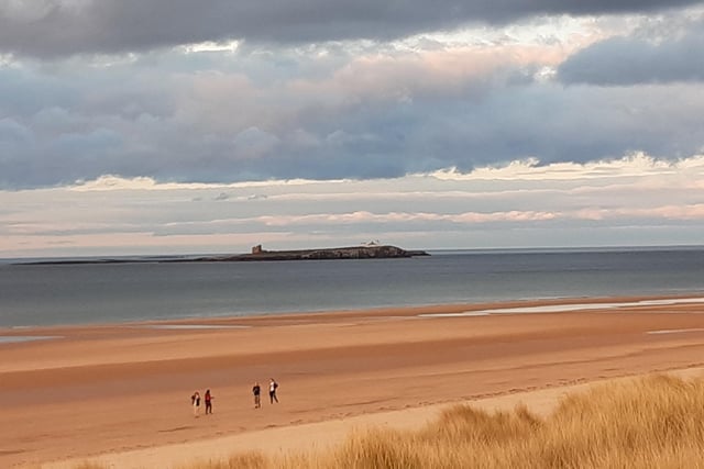 Bamburgh beach is popular any time the sun shines but there's always plenty of space for everyone to enjoy the amazing views across to the Farne Islands.