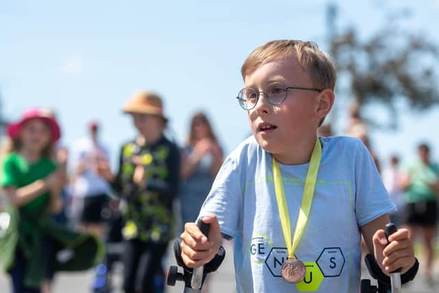 The nine-year-old has been crossing off miles from his Ironman Challenge since June 2020.