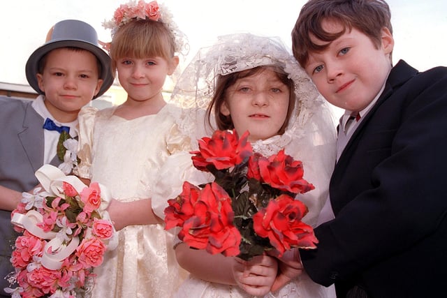 Town Field Primary School's mock wedding couples are, Craig Takacs and Amy Martin, and Abby Hughes and Dominic Jeffrey, all aged six.