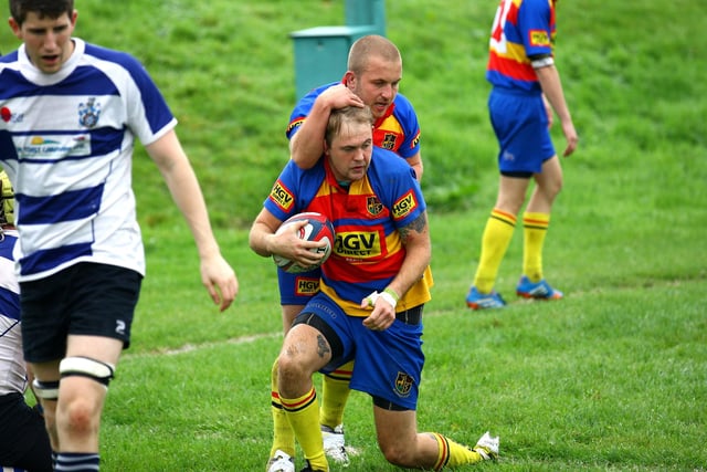 Buxton's Steve Jackson is congratulated on scoring a try by Chris Rees.