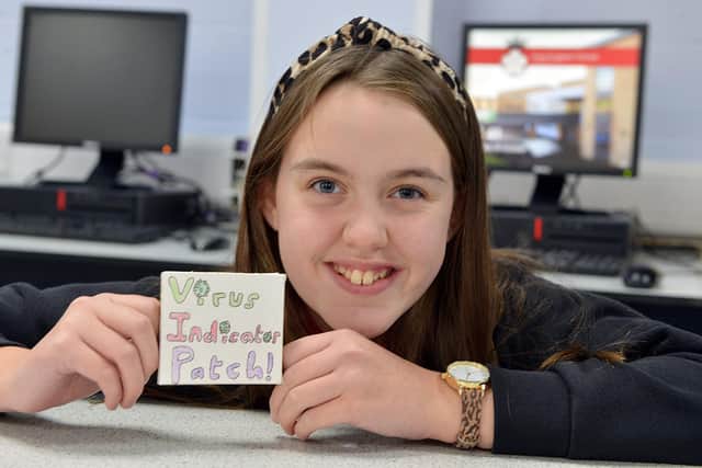 King Ecgbert School pupil Daisy Haigh with virus indicator patch for the Big Bang competition.