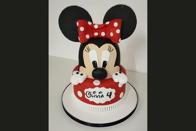 This Minnie Mouse cake looks almost too good to eat.