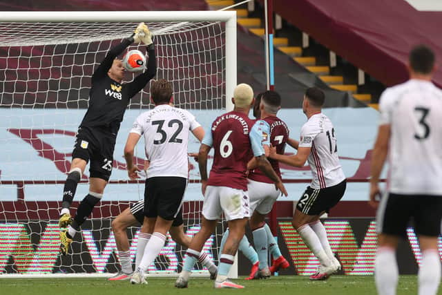 Aston Villa's Orjan Nyland caught then carried the ball over the line but a Sheffield United goal wasn't given  (Photo by CARL RECINE/POOL/AFP via Getty Images)
