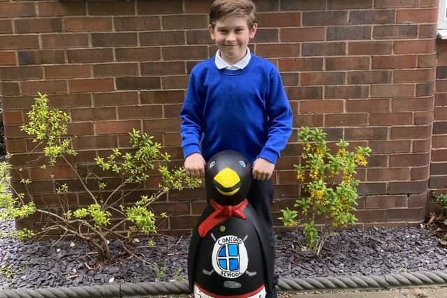 Bradley Law at Concord Junior School, Sheffield with his penguin, Bob, redesigned for iceSheffield