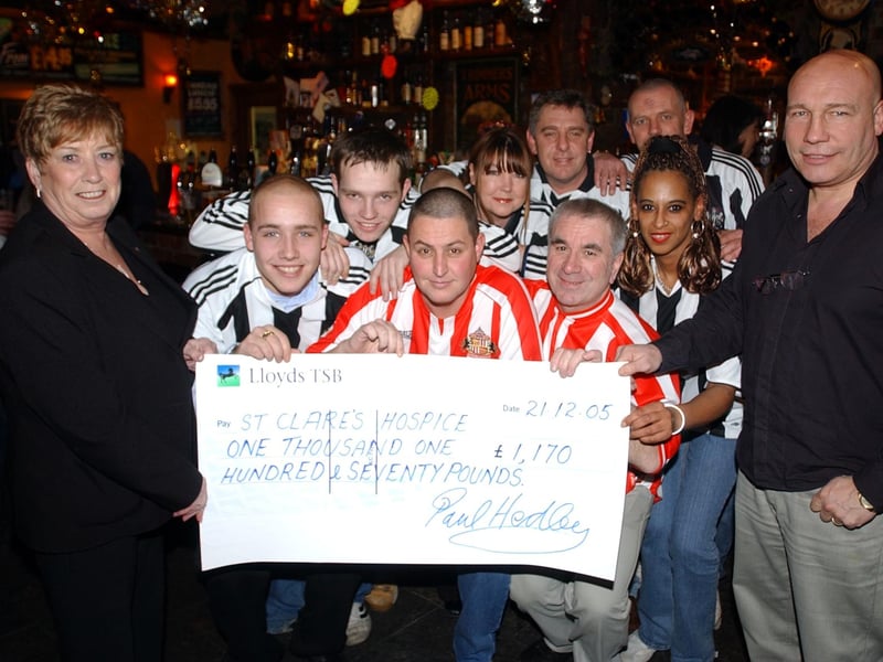 A cheque for St Clare's Hospice from the Trimmers Arms in 2005.