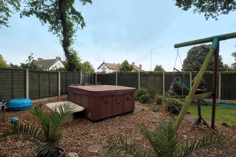 This hot tub is in the garden of a five-bedroom house which also has a games room and en-suite. Price: £359,950