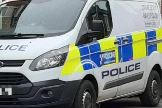 A body has been found at Silverwood Miners Welfare Resource Centre. File picture shows a police van.